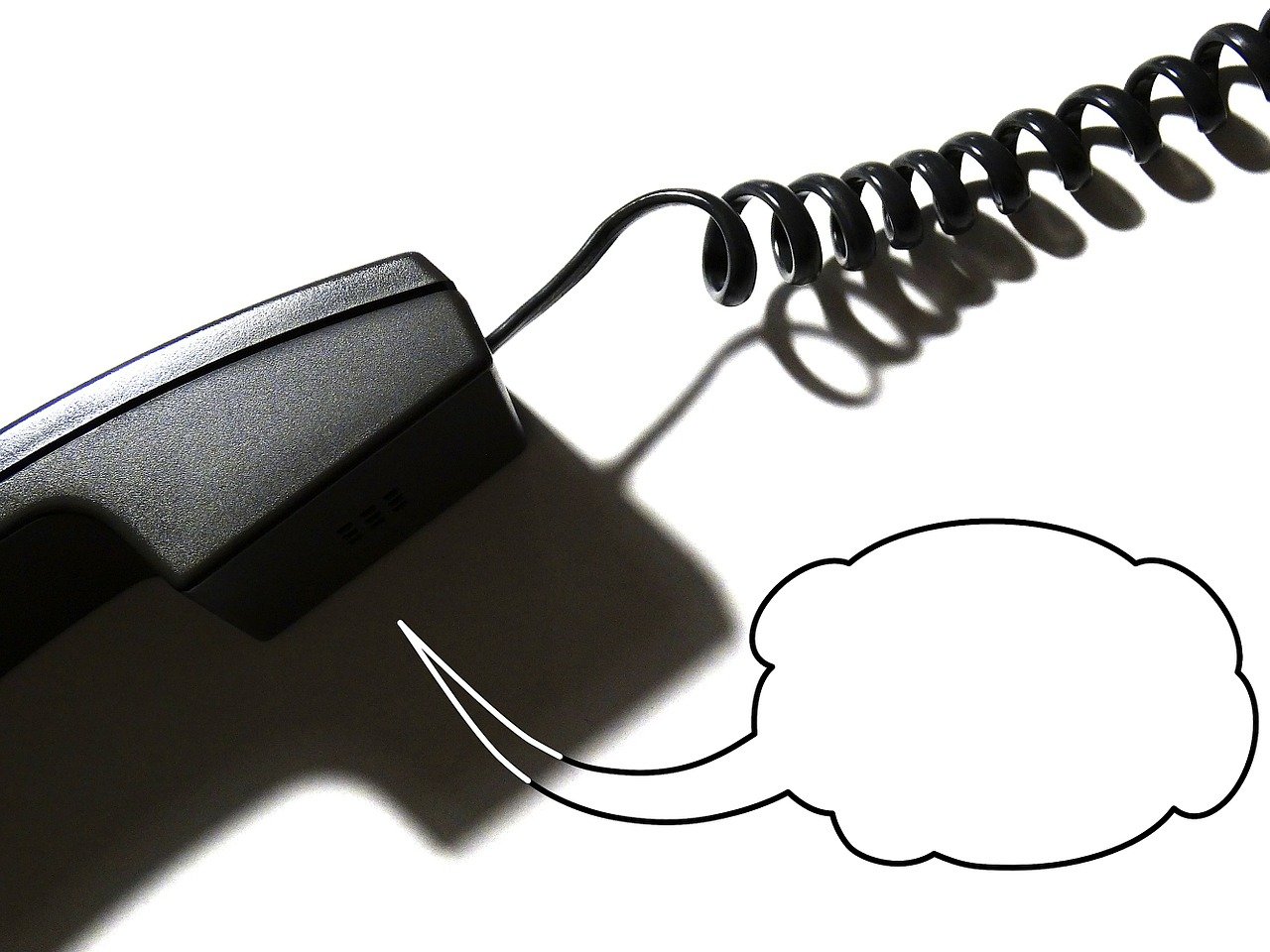 man sieht die Illustration eines Telefons mit Sprechblase